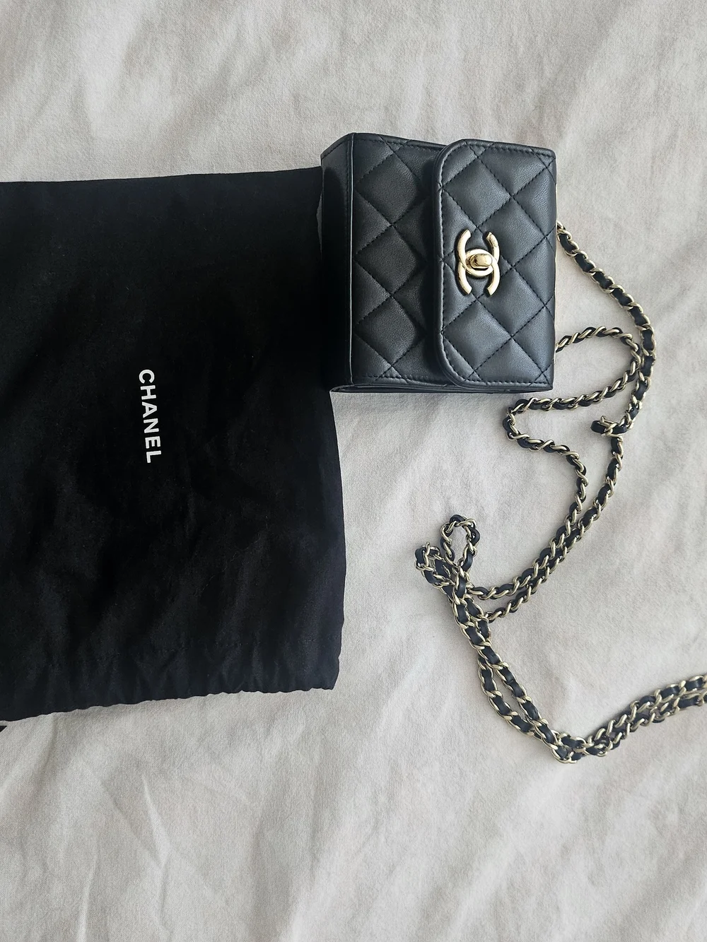 CHANEL Black Quilted Leather Mini Chain Wallet with Gold Hardware